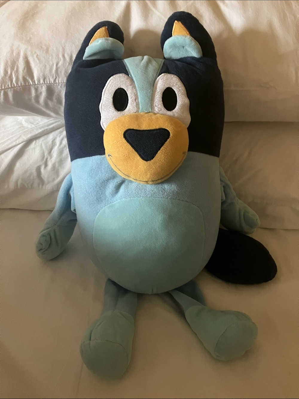 Bluey plush doll. Measures about 18” laying flat